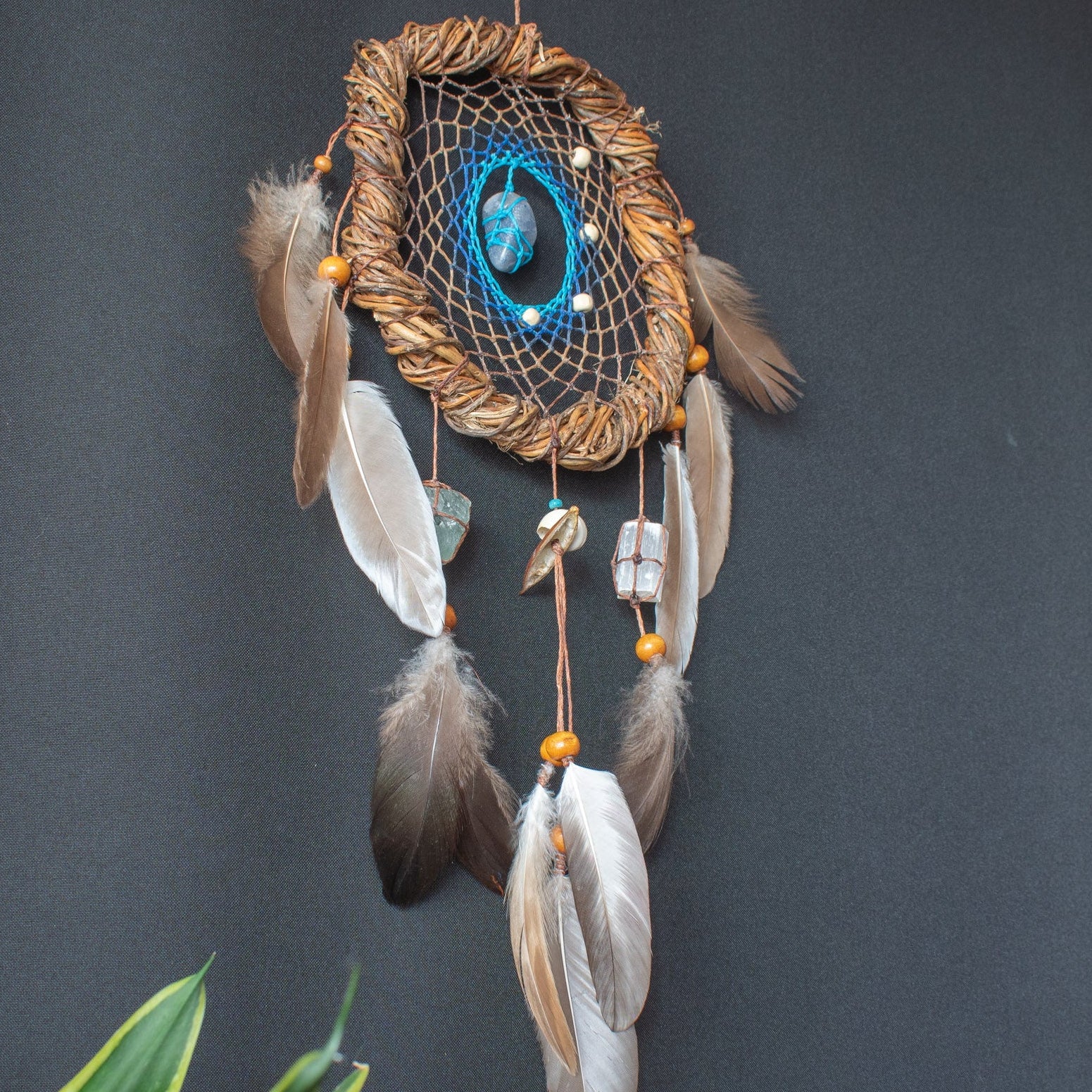 Handcrafted 6-inch protection dreamcatcher with a 3-crystal set. Part of the Coastal Soul collection by ArMoniZar.