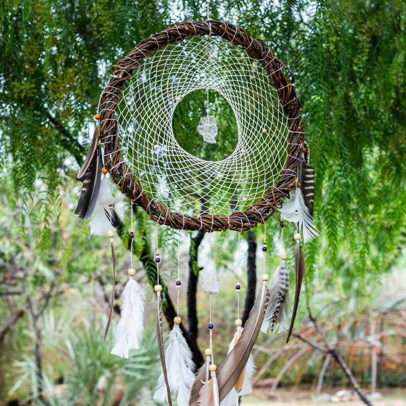 Elegant white dreamcatchers with crystals for energy healing